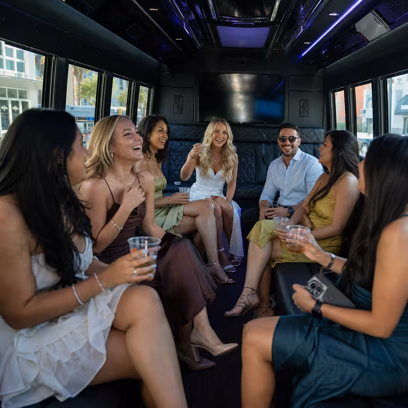 Party bus interior with wraparound leather seating and LED lighting in Myrtle Beach