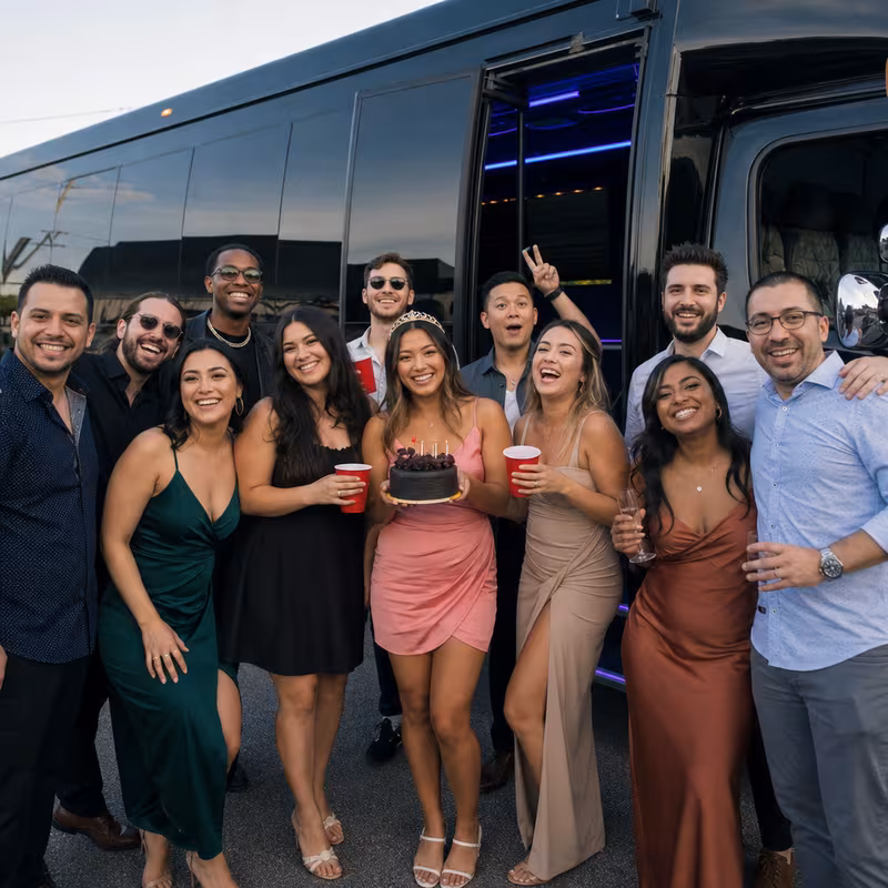 Group boarding a white charter bus for Birthday Transportation transportation in Myrtle Beach