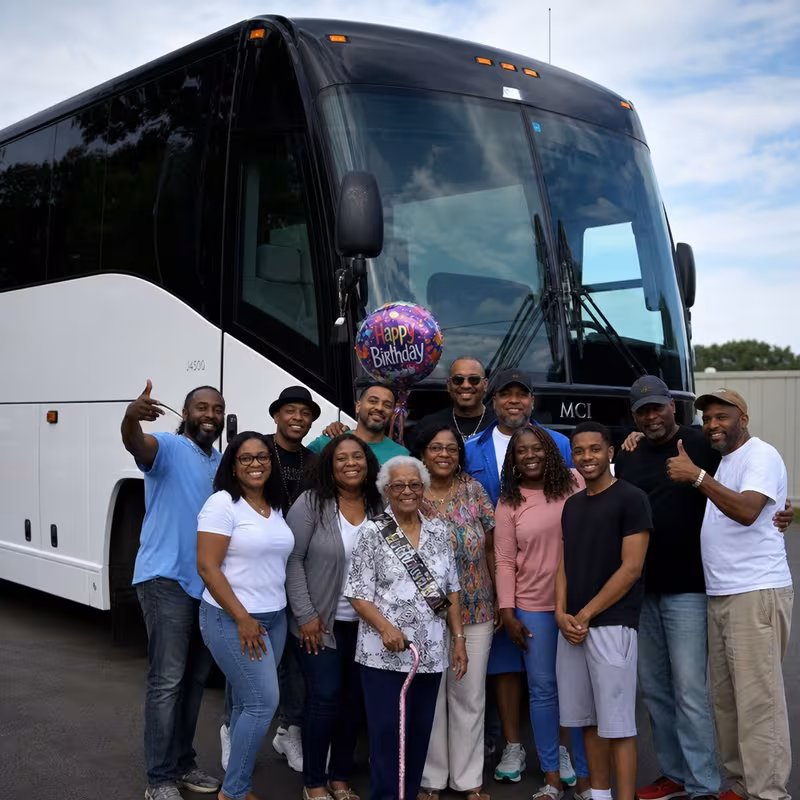 Passengers loading luggage while boarding an Myrtle Beach group shuttle