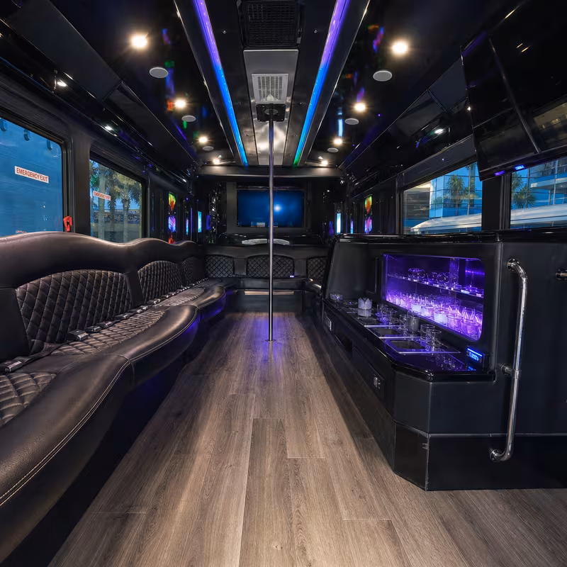 Party bus interior with wraparound leather seating and LED lighting in Myrtle Beach