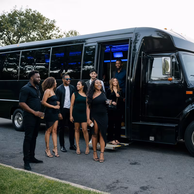 Passengers loading luggage while boarding an Myrtle Beach group shuttle