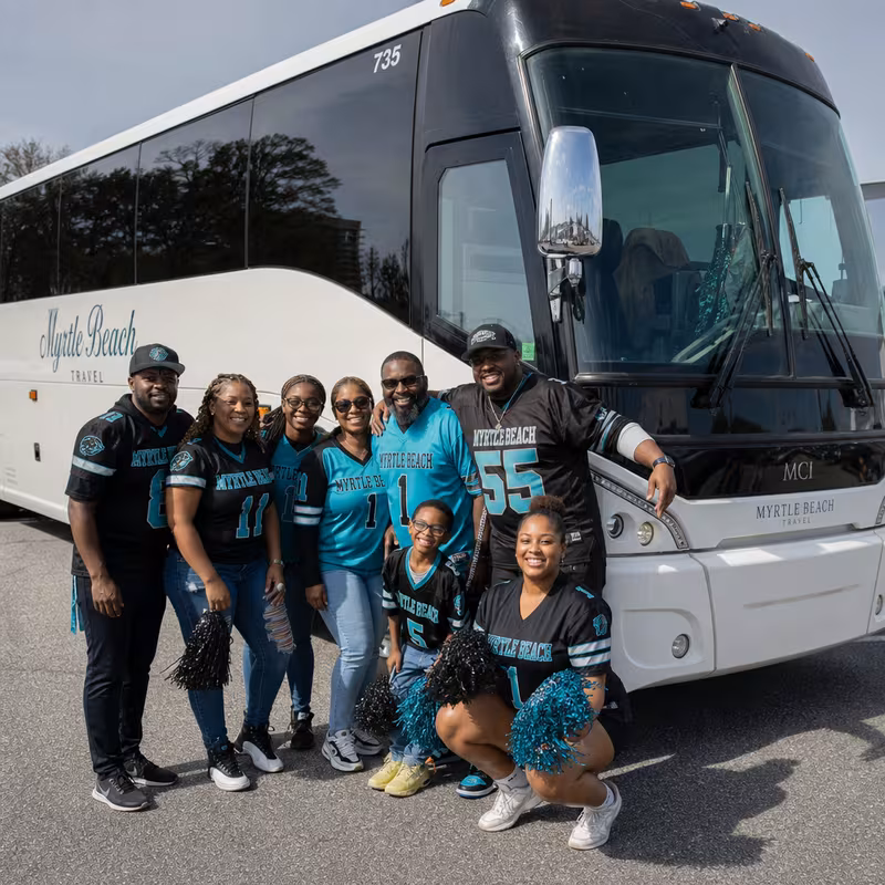 Passengers loading luggage while boarding an Myrtle Beach group shuttle