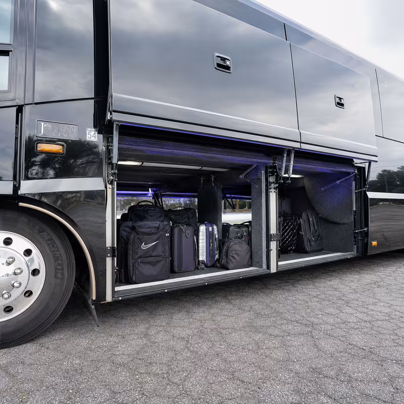 Party bus interior with wraparound leather seating and LED lighting in Myrtle Beach