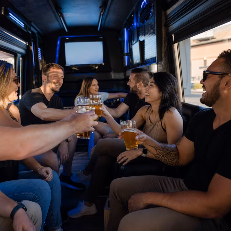 Group boarding a white charter bus for Winery & Brewery Tour Transportation transportation in Myrtle Beach